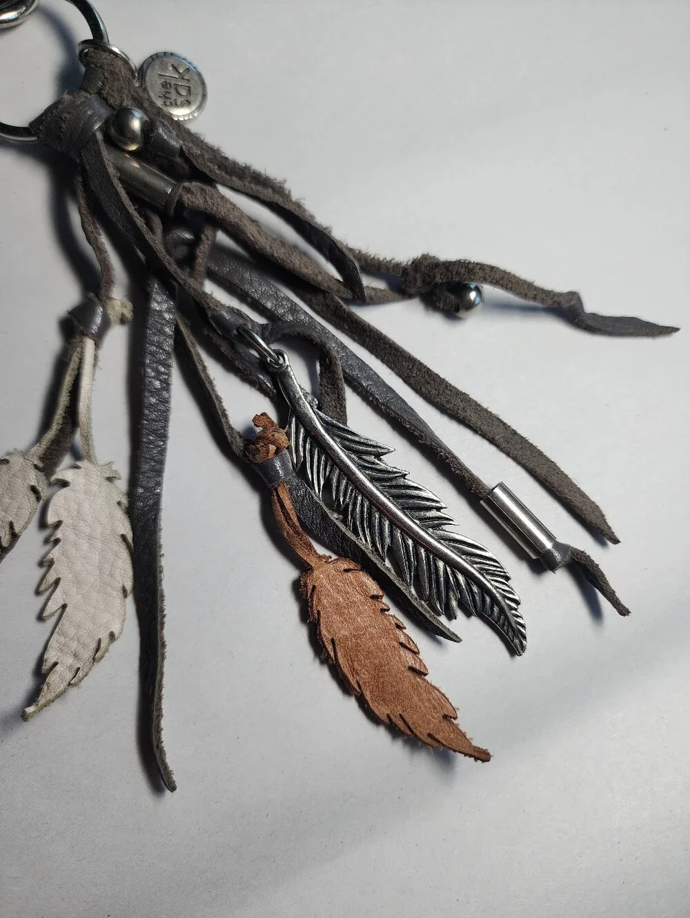 The Sak Leather Feather Tassel Keychain Charm Gray, White & Brown Bohemian